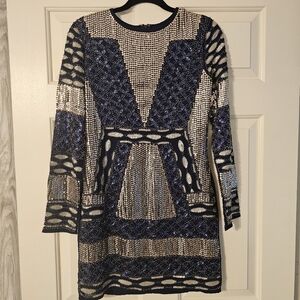 Endless Rose sequin mini dress. Fully lined.